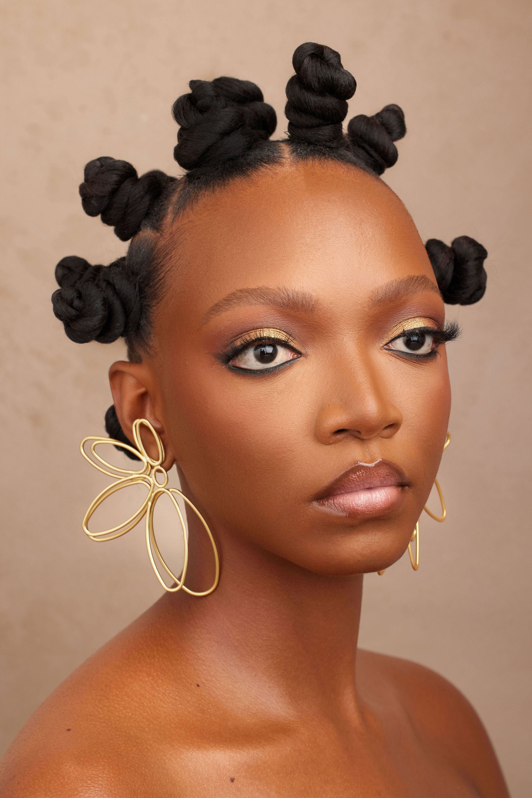 PREE large gold earring side view